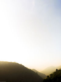 Scenic view of mountains against clear sky