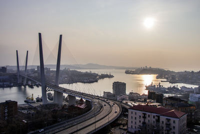 High angle view of city at sunset