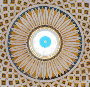 Directly below shot of ceiling of building