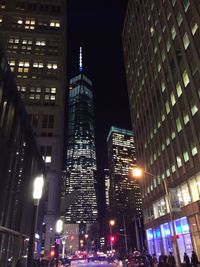 Low angle view of modern building at night