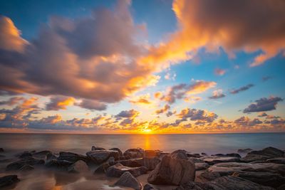 Scenic view of sea against sky during sunset