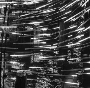 Low angle view of illuminated modern buildings at night