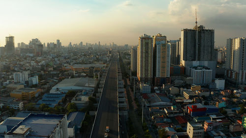 High angle view of cityscape against sky during sunset