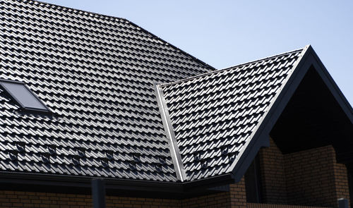 Low angle view of modern building against clear sky