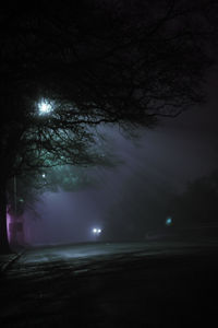 View of illuminated street at night