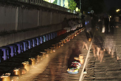 High angle view of people in illuminated building at night