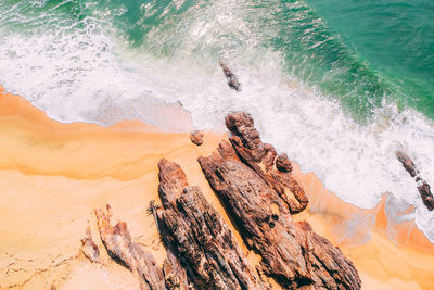 Aerial view of rocks at beach