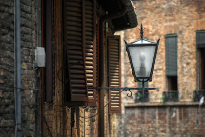 Lighting equipment by window of old building