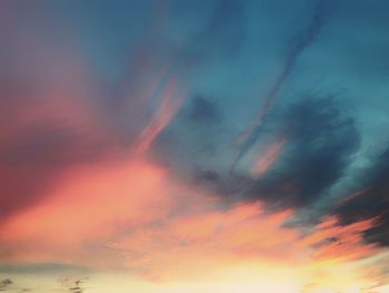 Low angle view of rainbow in sky