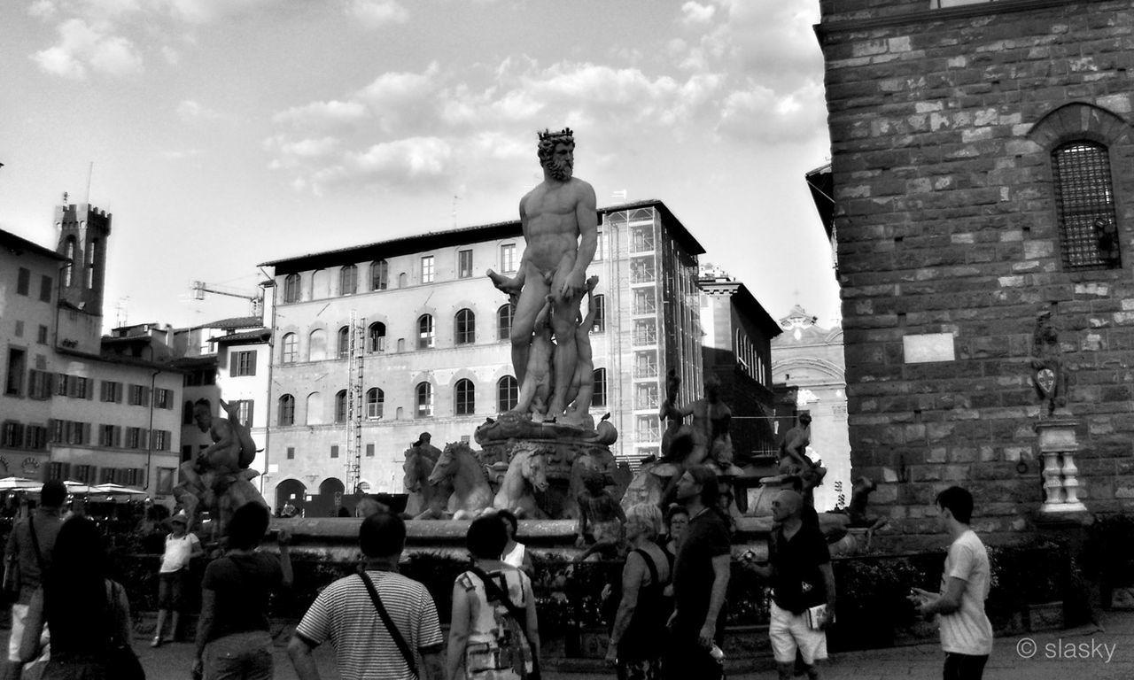 architecture, building exterior, built structure, sky, men, large group of people, history, person, city, travel destinations, famous place, cloud - sky, lifestyles, tourist, cloud, tourism, day, building, travel