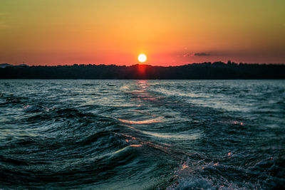 Scenic view of sea against sky during sunset