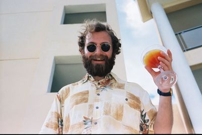 Portrait of man drinking cocktail 