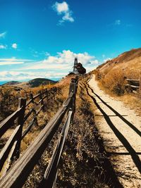 Railroad tracks against sky