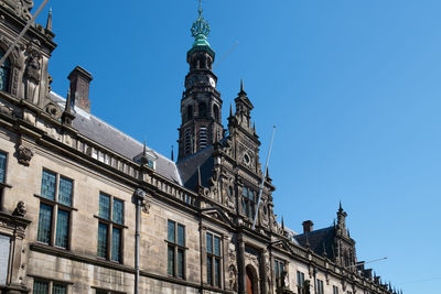 Low angle view of buildings against sky