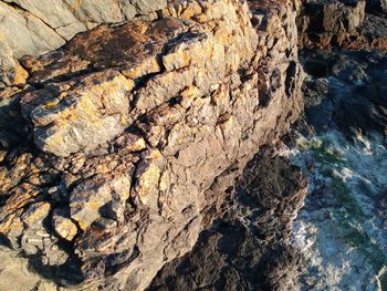 Close-up of rock formation in water