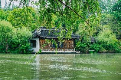 Gazebo by slender west lake at park