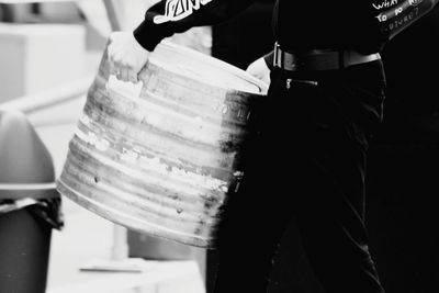 Close-up of man working on book