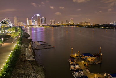 Aerial view of city lit up at night