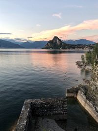 Scenic view of lake against sky during sunset