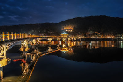 Woryonggyo wooden bridge in andong, south korea taken at night during night light illumination.