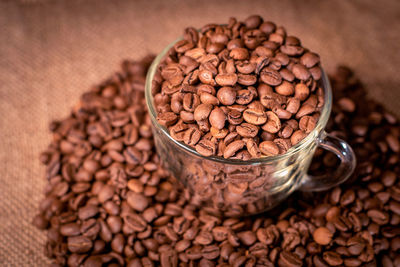 Close-up of coffee beans on table