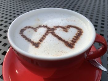 Close-up of cappuccino on table