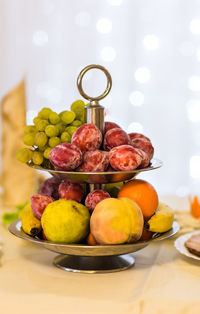 Close-up of fruits in plate on table