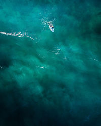 High angle view of person swimming in sea