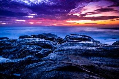 Scenic view of sea against sky during sunset