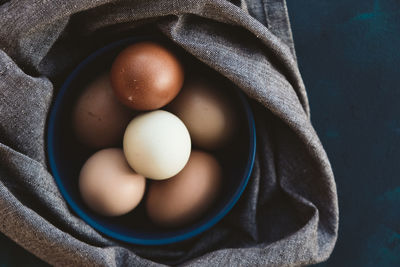 High angle view of eggs in container on table