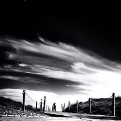 View of landscape against cloudy sky