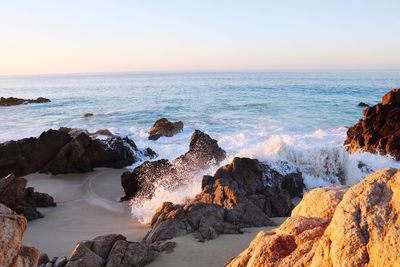 Scenic view of sea against clear sky