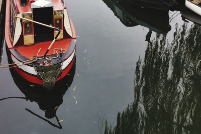 High angle view of boat moored in lake