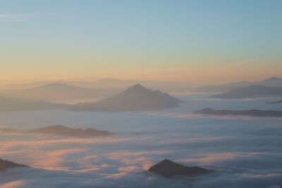 Scenic view of mountains against sky during sunset