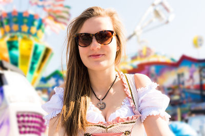 Portrait of young woman wearing sunglasses