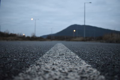 Surface level of road against sky