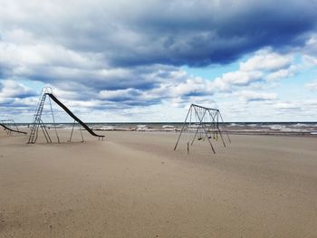 Scenic view of beach against sky