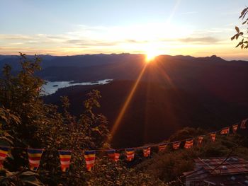Scenic view of mountains against sky during sunset