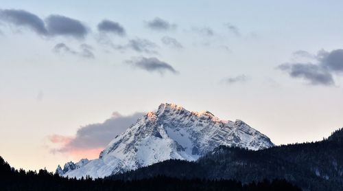 Scenic view of mountains against sky during winter