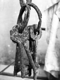 Close-up of rusty metal hanging outdoors