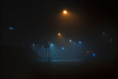 Illuminated street lights at night