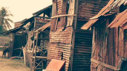 Old wooden house against sky