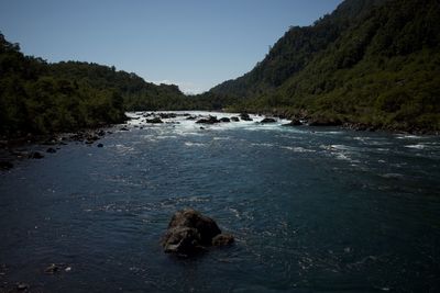 Scenic view of river against sky