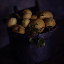 Close-up of fruits in basket on table