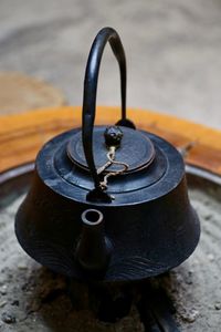 Close-up of old cast iron japanese tea pot