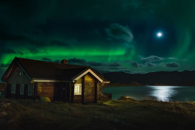 Built structure against sky at night