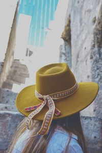 Rear view of woman wearing hat