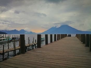 Pier over sea against sky