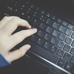 Close-up of person using mobile phone