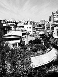 Buildings in city against sky